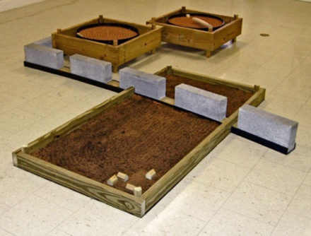 Earthscape/Down on the Farm
Wood, Vinyl, Concrete Block, 
Nails, Roofing Paper, 
Top Soil, Sand
10&rsquo; 8&rdquo; L. x 8&rsquo; 6&rdquo; W. x 1&rsquo; H.
2007